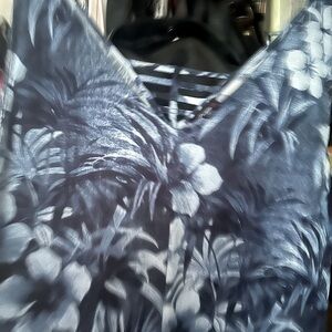 Women’s size 2Xl romper. Wide leg and very comfortable. Blue with white flowers.